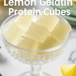 Soft lemon gelatin protein cubes served in a vintage glass dish, surrounded by fresh lemons, showing a light and stomach-friendly bariatric snack.